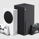 An Xbox Series X and S stand side by side against a grey background.